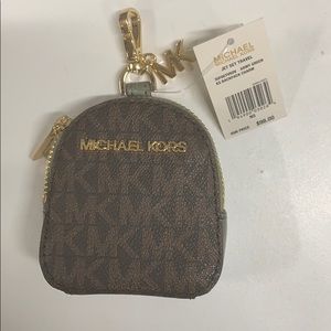 Mk back pack charm